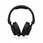 Behringer HPX6000 black professional DJ headphones shown from the front with padded headband and over-ear earcups