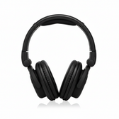 Behringer HPX6000 black professional DJ headphones shown from the front with padded headband and over-ear earcups