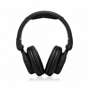 Behringer HPX6000 black professional DJ headphones shown from the front with padded headband and over-ear earcups