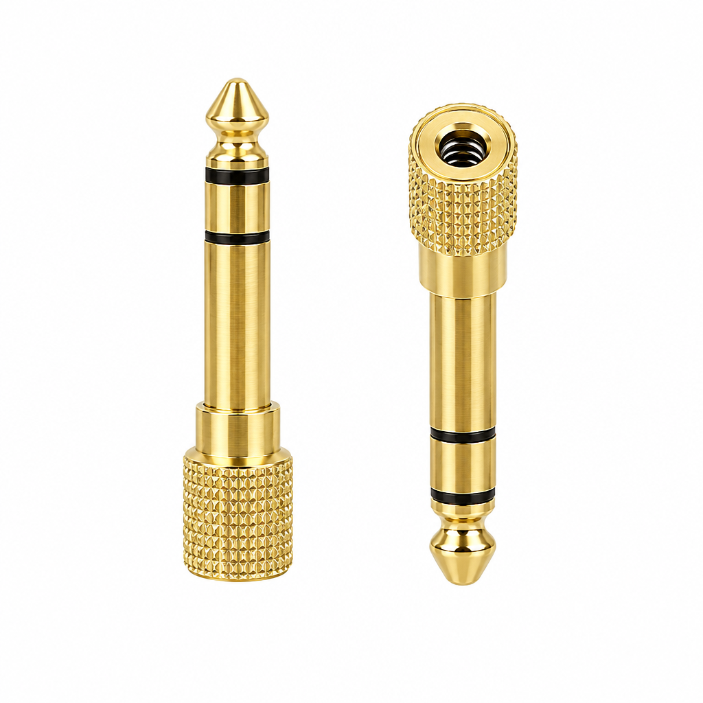 Unbranded gold jack converter shown from the front with its two converter pieces and gold connector bodies