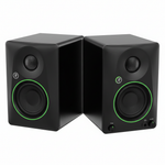 Pair of two Mackie CR4.5BT black powered studio monitors shown at a three-quarter angle with cabinet depth, 4.5-inch woofers, tweeters, and green trim