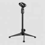 Unbranded ZM-07 mini microphone stand shown from the front with its microphone clip, adjustable support, and stable round base