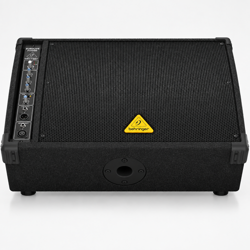 Front view of the Behringer Eurolive F1320D active floor monitor with its wedge cabinet and grille.