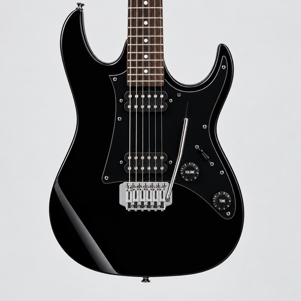Straight-on close-up of the Ibanez GRX20-BKN pickups, strings, bridge, and controls.