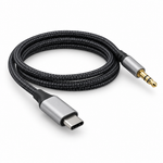 TRCADE321-6 USB-C to 3.5 mm AUX audio cable, angled view showing the braided cable, USB-C connector, and 3.5 mm AUX plug