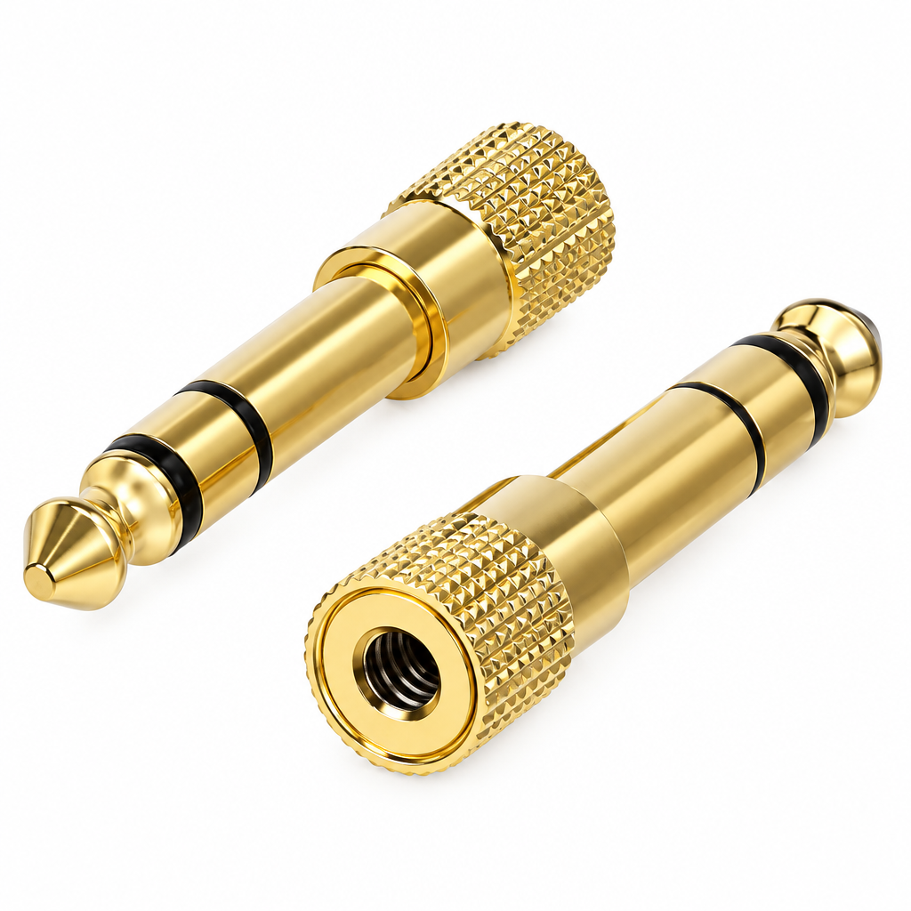 Close detail of the unbranded gold jack converter showing its two converter pieces, connector ends, and textured sleeves