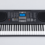 Close detail of the unbranded MK2106 electronic keyboard LCD screen, control panel, speakers, buttons, and upper keys