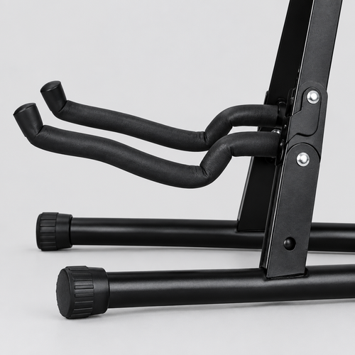 Close detail of the unbranded J-40E guitar stand padded contact arms, folding joint, frame, and rubber foot