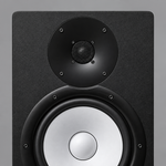 Close-up of the Yamaha HS8I tweeter and 8-inch woofer on the black front baffle.