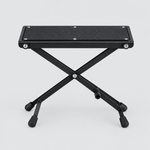Unbranded J-46 foldable guitar footrest shown from the front with a textured top platform and rubber feet