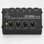 Front view of the Behringer MicroAMP HA400 showing its four headphone outputs and independent level controls.