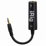 Close-up of the iRig guitar interface adapter showing the 3.5 mm plug, audio jack, controls, and genuine iRig marking