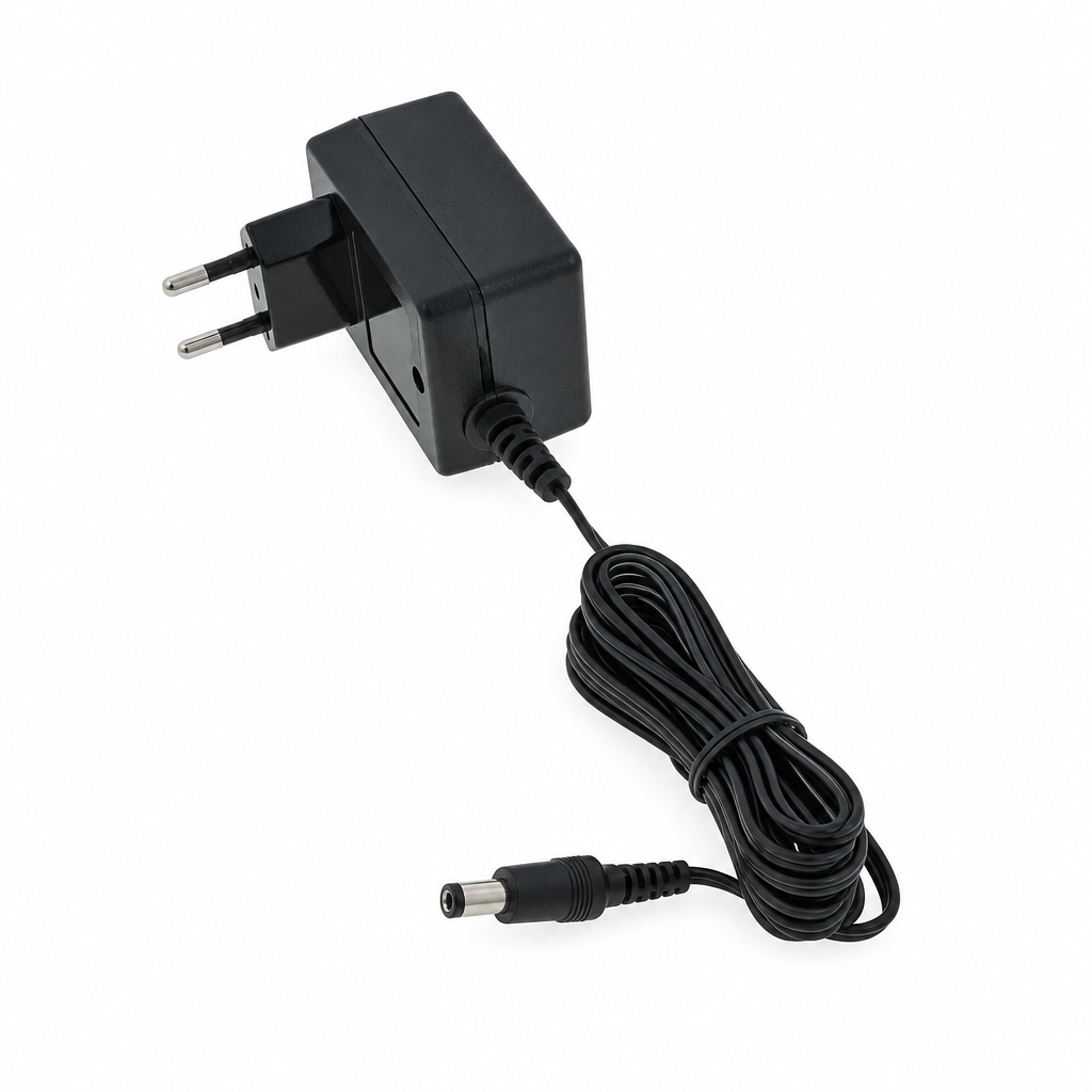 Full view of the black Yamaha PA 150B AC power adapter with two round plug pins and DC barrel cable