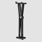Unbranded QA210 black double-X keyboard stand shown folded into a compact storage position