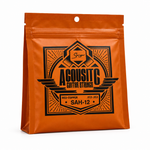 Smiger SAH-12 .012-.053 red copper acoustic guitar strings package, three-quarter angled view showing package thickness and original manufacturer design