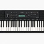 Close-up of the Yamaha PSR-E283 control panel and adjacent keys.