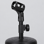 Close detail of the unbranded ZM-02 mini microphone stand showing its microphone clip, adjustment joint, knob, support, and base