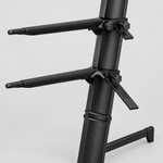Close detail of the unbranded Z-80 black double keyboard stand adjustable padded support arms, locking knobs, central frame, and base