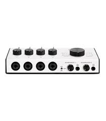Audio interface with knobs and jacks on a white background