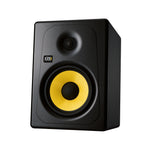 Black and yellow KRK studio monitor speaker on a white background