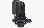 Black studio microphone with a mesh cover on a white background