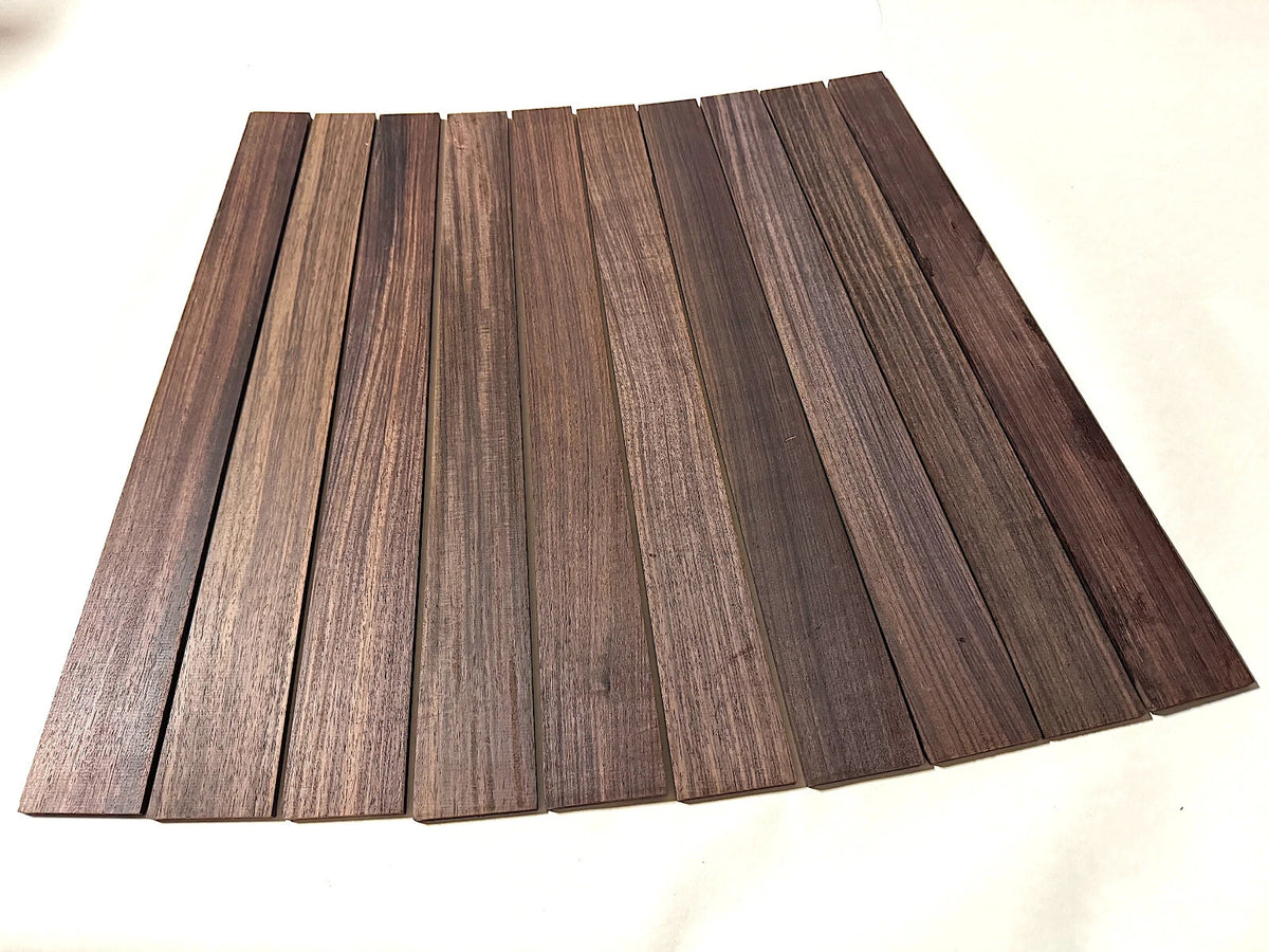 Oud fingerboard made of ebony and rosewood.