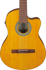 Acoustic guitar with a wooden body and neck on a white background