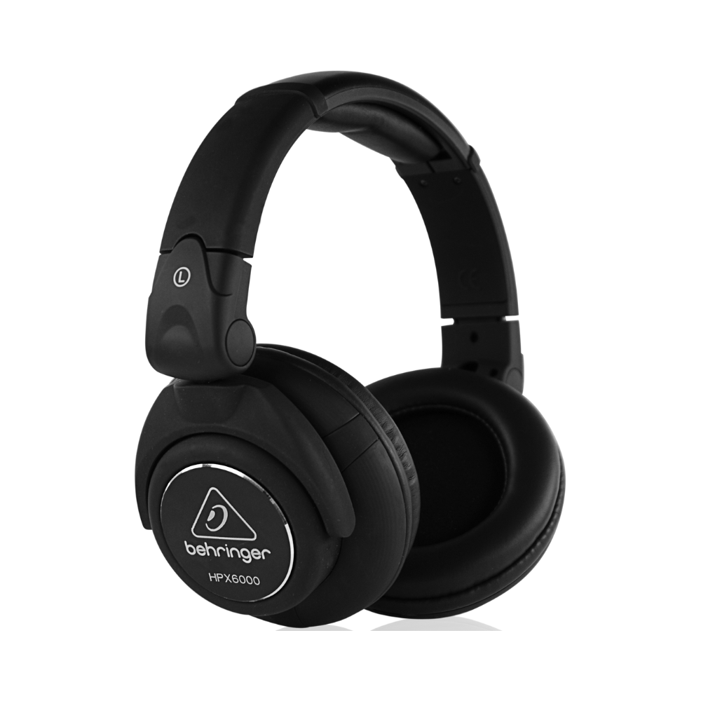 Black headphones with Behringer logo on a white background