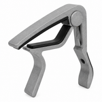 Unbranded BDJ-007 guitar capo shown in a three-quarter view with its metal body, spring mechanism, and contact pads